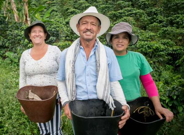 Mexican farmers holding buckets