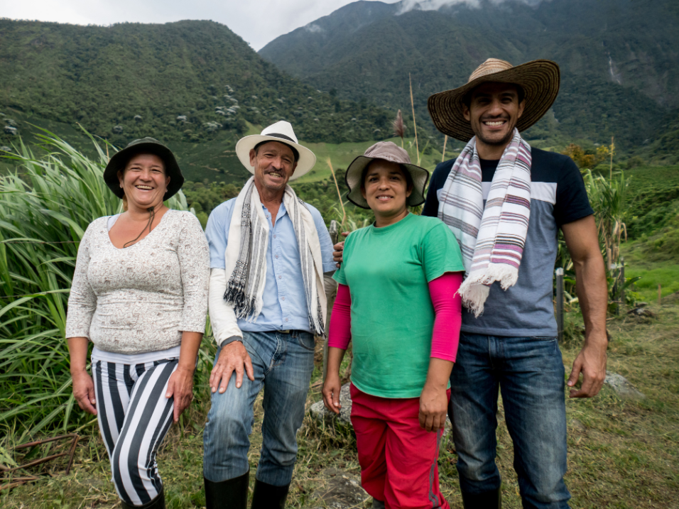 Family of Mexican farmers smiling